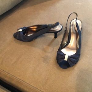 Open toe, sling back shoe